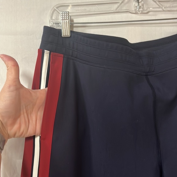 NWT Lululemon Cover your Tracks pants. Size 12. Red, white, navy blue.
LL22 - Picture 6 of 12